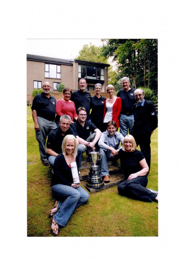 Alistair Walker (second right, front row) with members of Tryst and the prestigious Howard de Walden trophy
